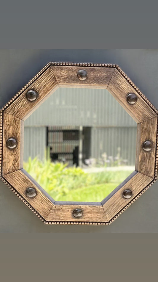 Regency-style octagonal shaped oak wall mirror with carved beaded trim