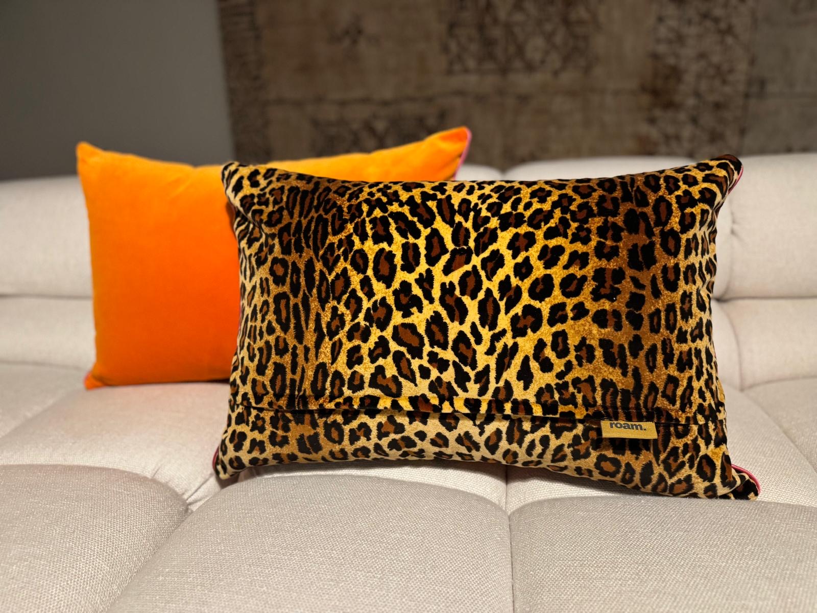 roam. Global Treasures custom cushion | Bold leopard print