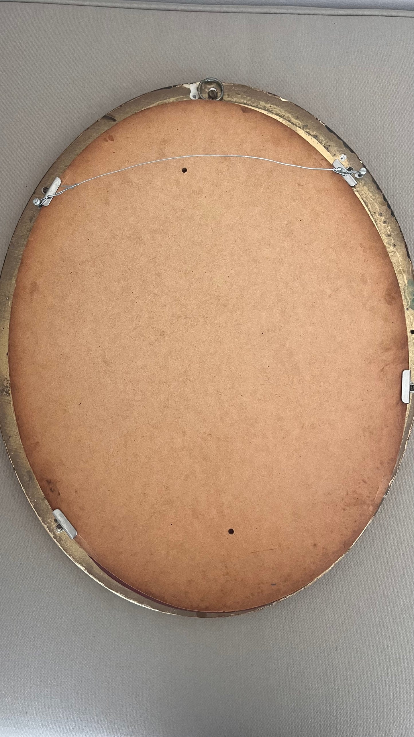 Vintage ornate gilt framed oval mirror