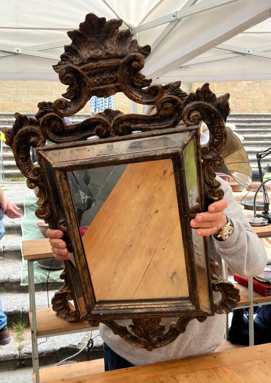 Antique Baroque-style mirror with ornate gilded frame